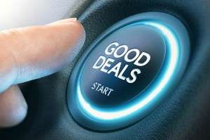 good deals button being pressed image